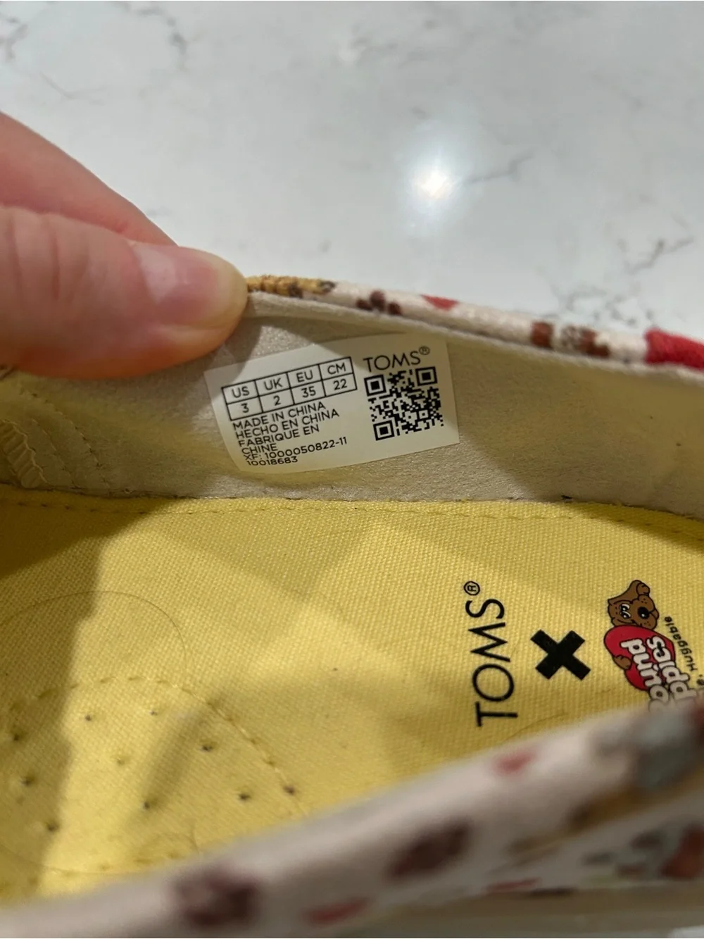 Toms Kids Cream Canvas Slip-Ons with Red Accents and Dog Print